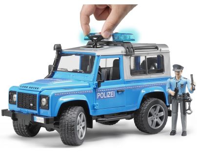 Bruder 02597 Policejný Land Rover Defender s policajtom
