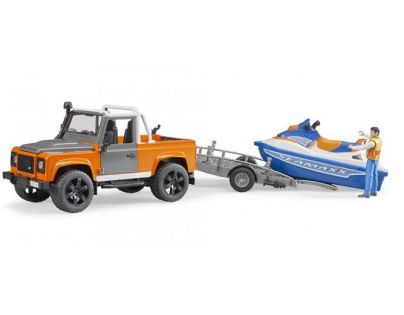 Bruder 2599 Land Rover s vodním skútrem a figurkou 1:16