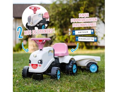 Falk Odstrkovadlo traktor Rainbow bielo ružový s volantom a vlečkou