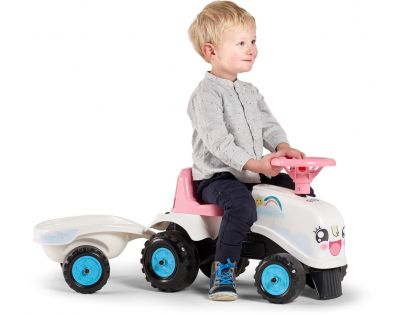 Falk Odstrkovadlo traktor Rainbow bielo ružový s volantom a vlečkou
