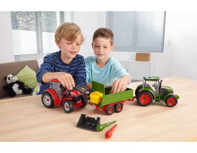 Revell Junior Kit traktor s figúrkou 1 : 20 červený