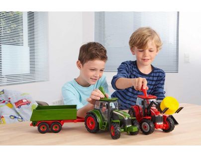 Revell Junior Kit traktor s figúrkou 1 : 20 červený