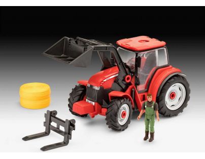 Revell Junior Kit traktor s figúrkou 1 : 20 červený