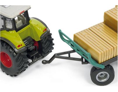 Siku Farmer Traktor s balíkovacím nástavcom a vlekom 1:50