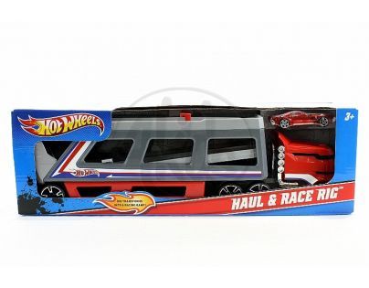 HW TAHAČ S ROZKLÁDACÍ DRÁHOU